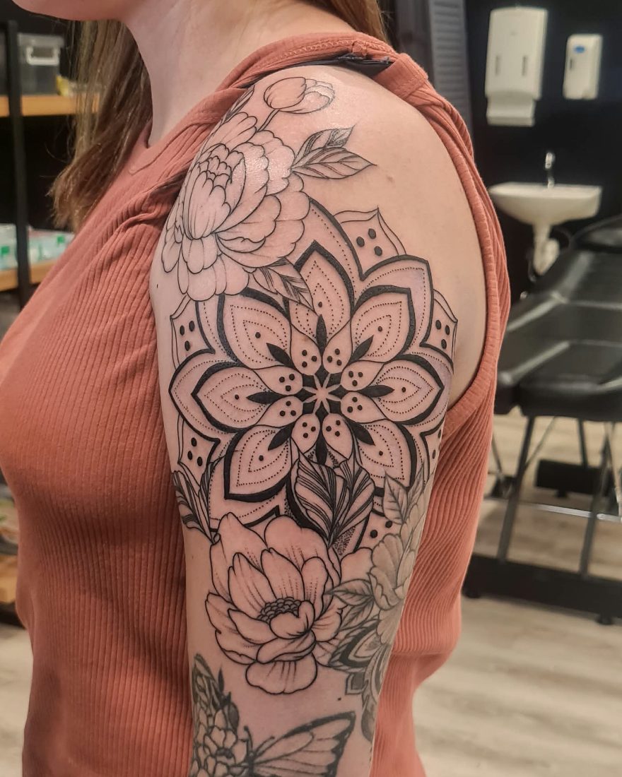 Fine line mandala with peonies wrapping the shoulder by Bruno at Hobart Tattoos