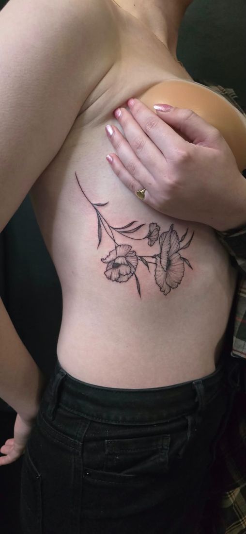 rib poppies tattoo by Bruno at Hobart Tattoos